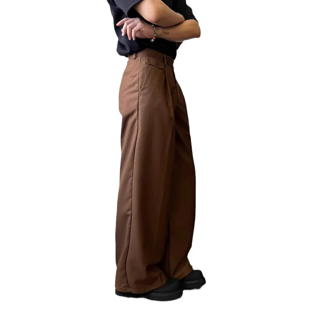 Men's brown straight-leg loose wide-leg casual suit trousers laid flat.