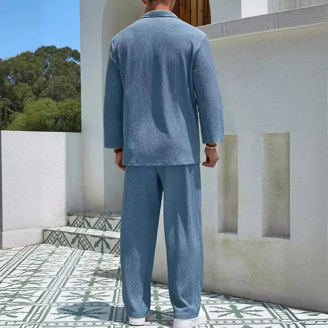 Men's casual shirt and trousers suit in polyester fabric, shown in one of four colours: lake blue, khaki, black, or caramel.