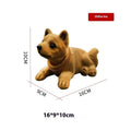 Resin head-shaking dog car decoration in multiple breed colour options on a car dashboard