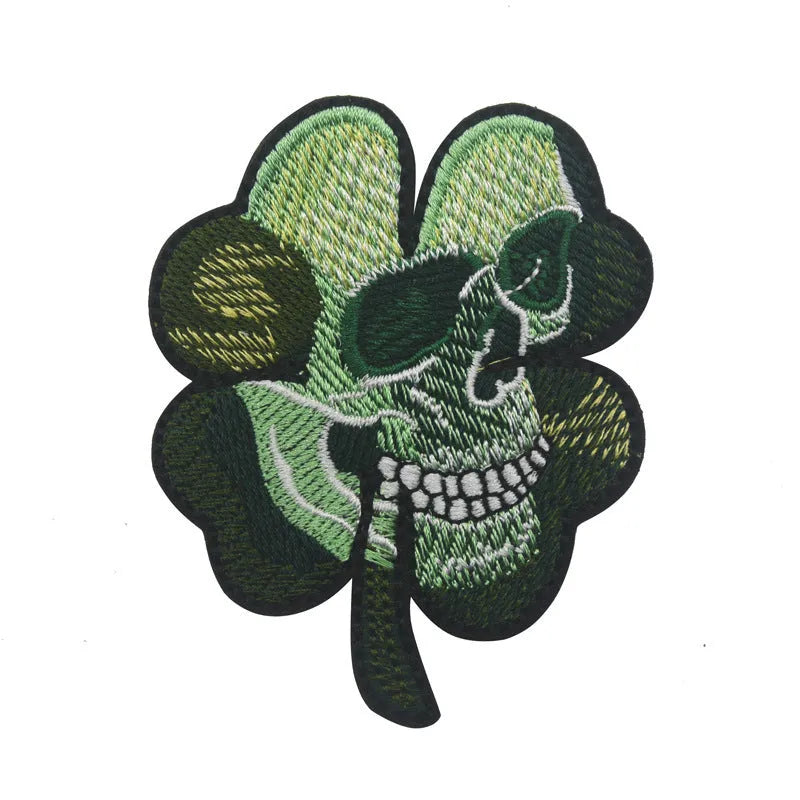 Embroidered fabric tactical badge with velcro backing showing military-inspired designs in green and black colours