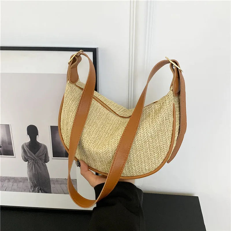 Women's straw woven crossbody bag with single strap and textured knitted appearance