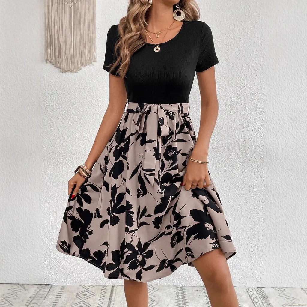 Women's khaki A-line dress with plant pattern and shoulder strap detail
