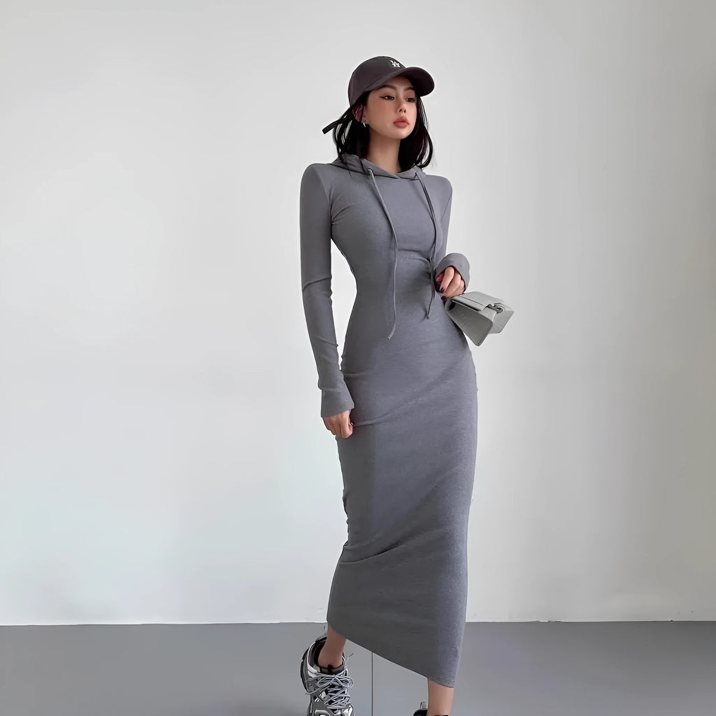 Women's grey hooded long-sleeve sheath dress with a high waist on a model