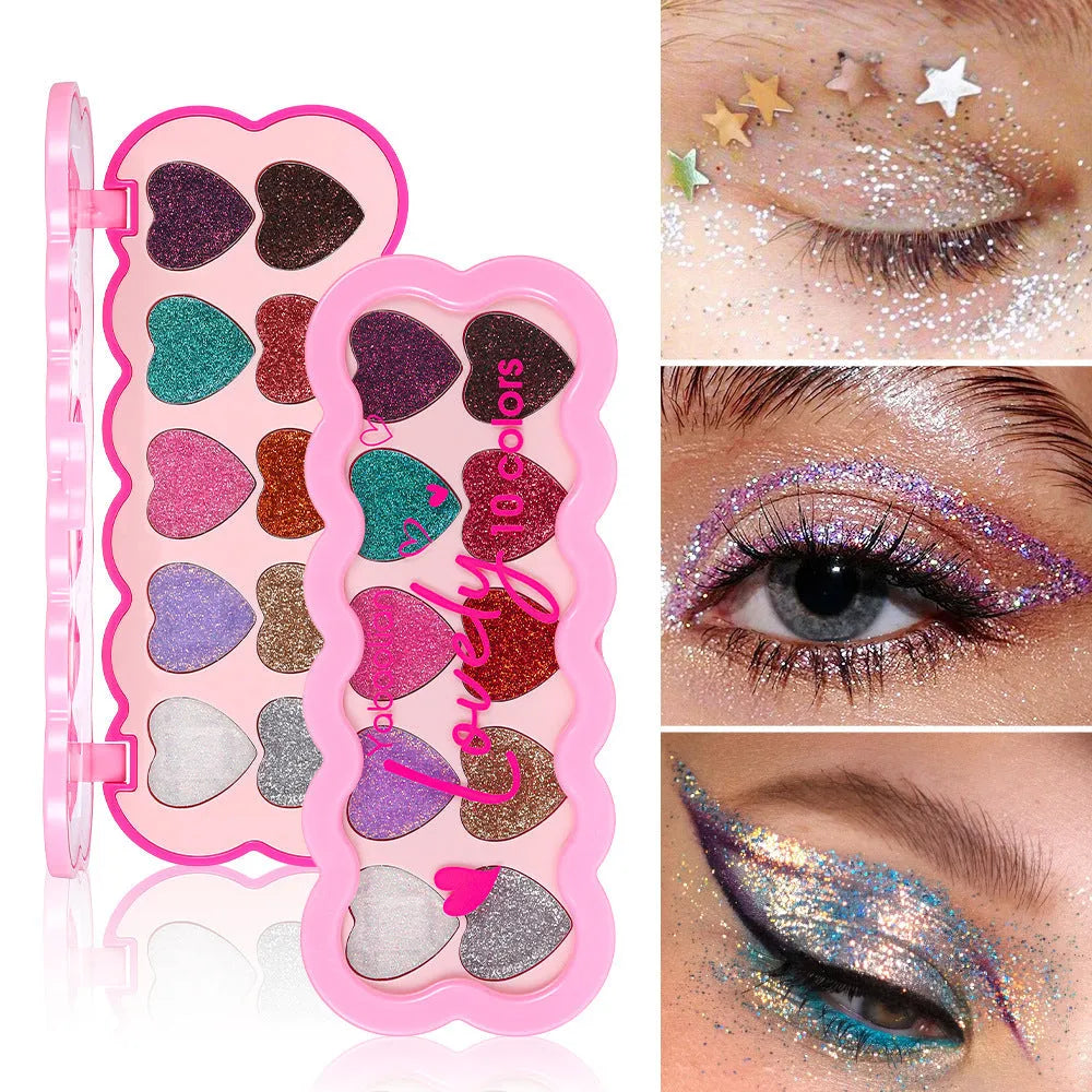 Pearlescent heart-shaped makeup palette open to show ten different coloured eyeshadows.