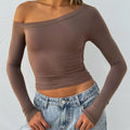 Women's slim fit knitted cardigan in solid colour with cross shoulder strap design