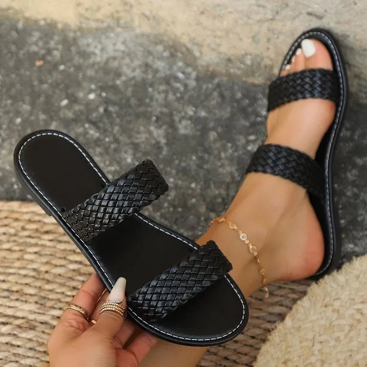 Plus size women's woven beach slippers with PVC sole in black and gold colour options.