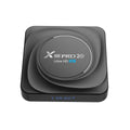 Dual-band WiFi Bluetooth TV box with Android 11.0, HDMI output, infrared remote, and UK power plug