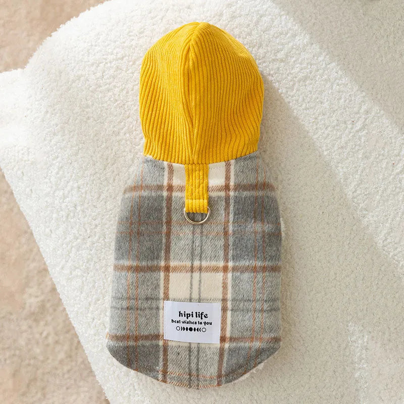 Blue corduroy chessboard grid pattern hooded vest for a dog on a neutral background