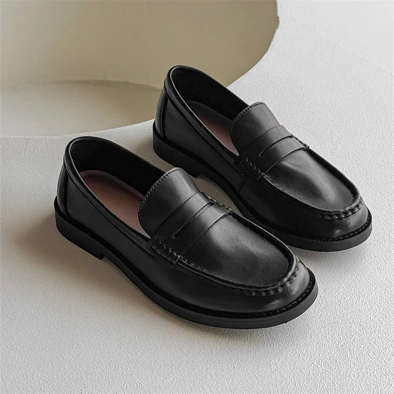 Men's slip-on retro casual shoes in brown with microfiber upper and rubber sole, side view.