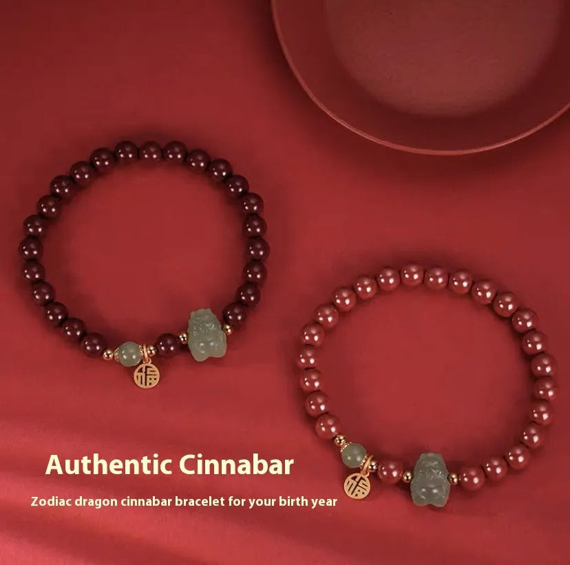 Natural Hetian jade cinnabar bracelet with 8mm beads, Emperor Sandstone style, on display