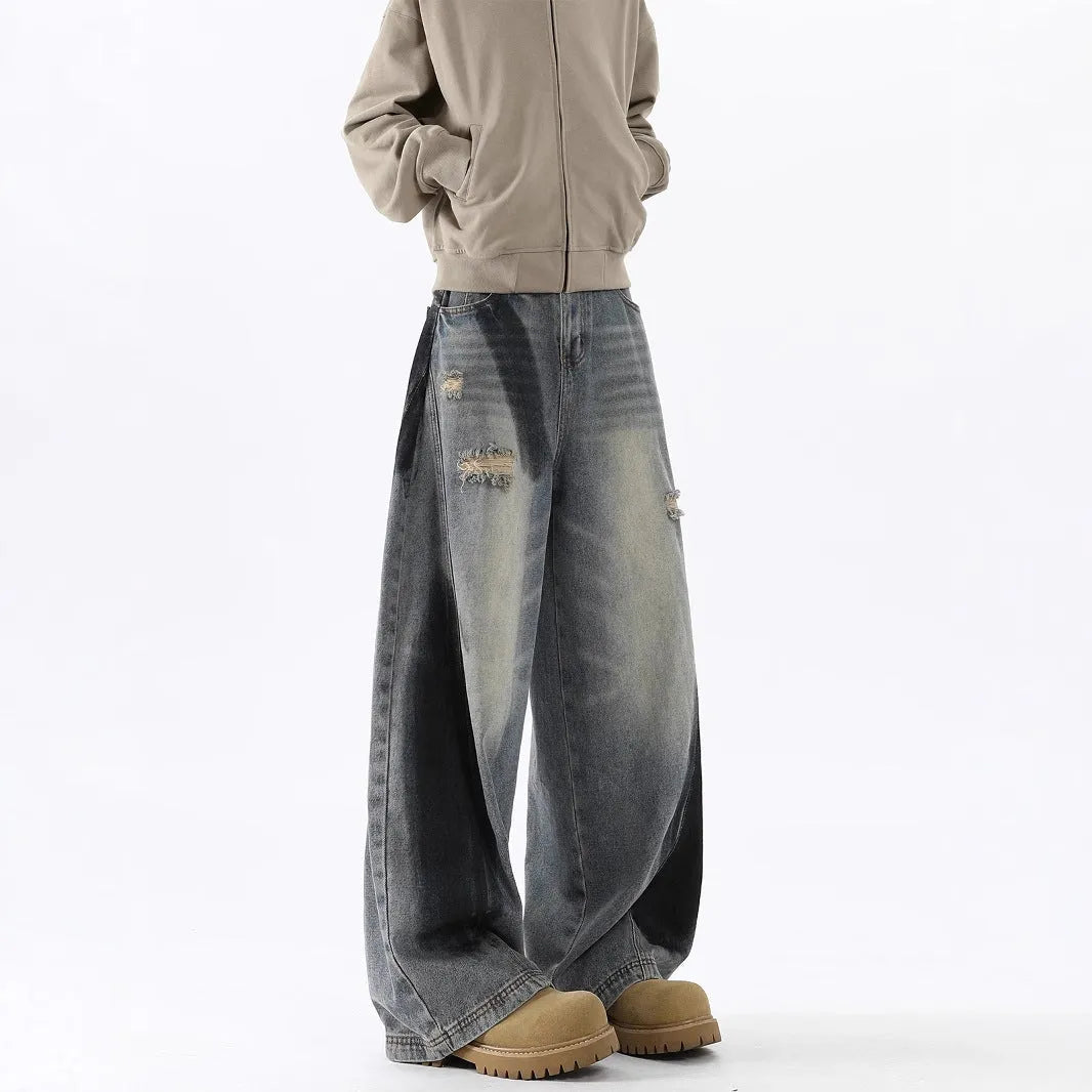 Men's blue American-style splash-ink ripped machete loose fit jeans with cotton fabric and mid waist