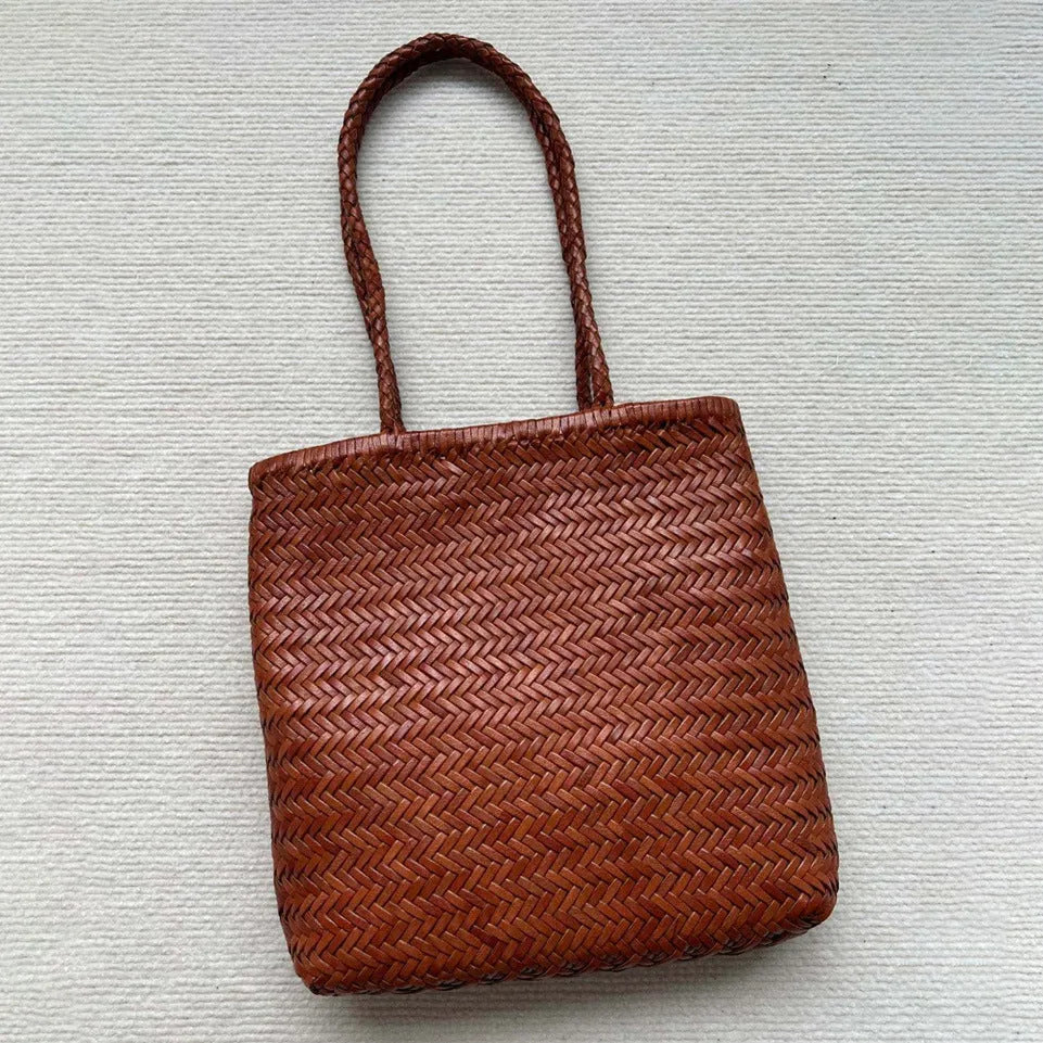 Handmade vintage woven leather shoulder bag in brown with three-dimensional pockets