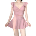 Women's one-piece solid colour swimsuit in milk silk fabric shown in black