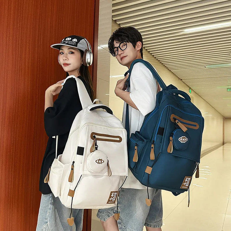 Japanese large capacity leisure travel backpack in black nylon with contrast stitching and waterproof finish