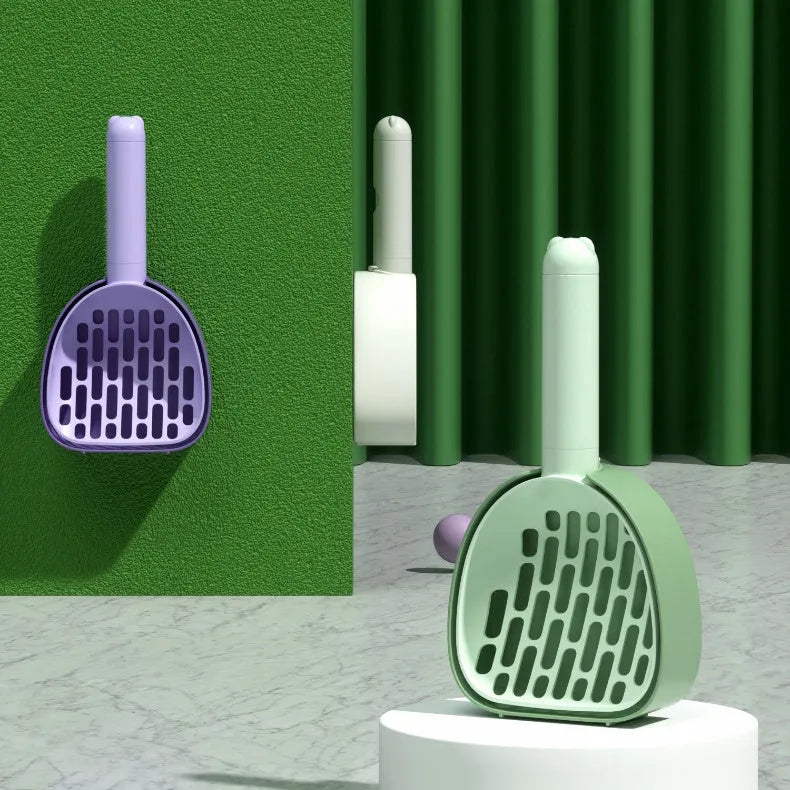 Plastic cat litter scoop with base in white model, showing hidden bag storage compartment and large scoop head with alternating apertures