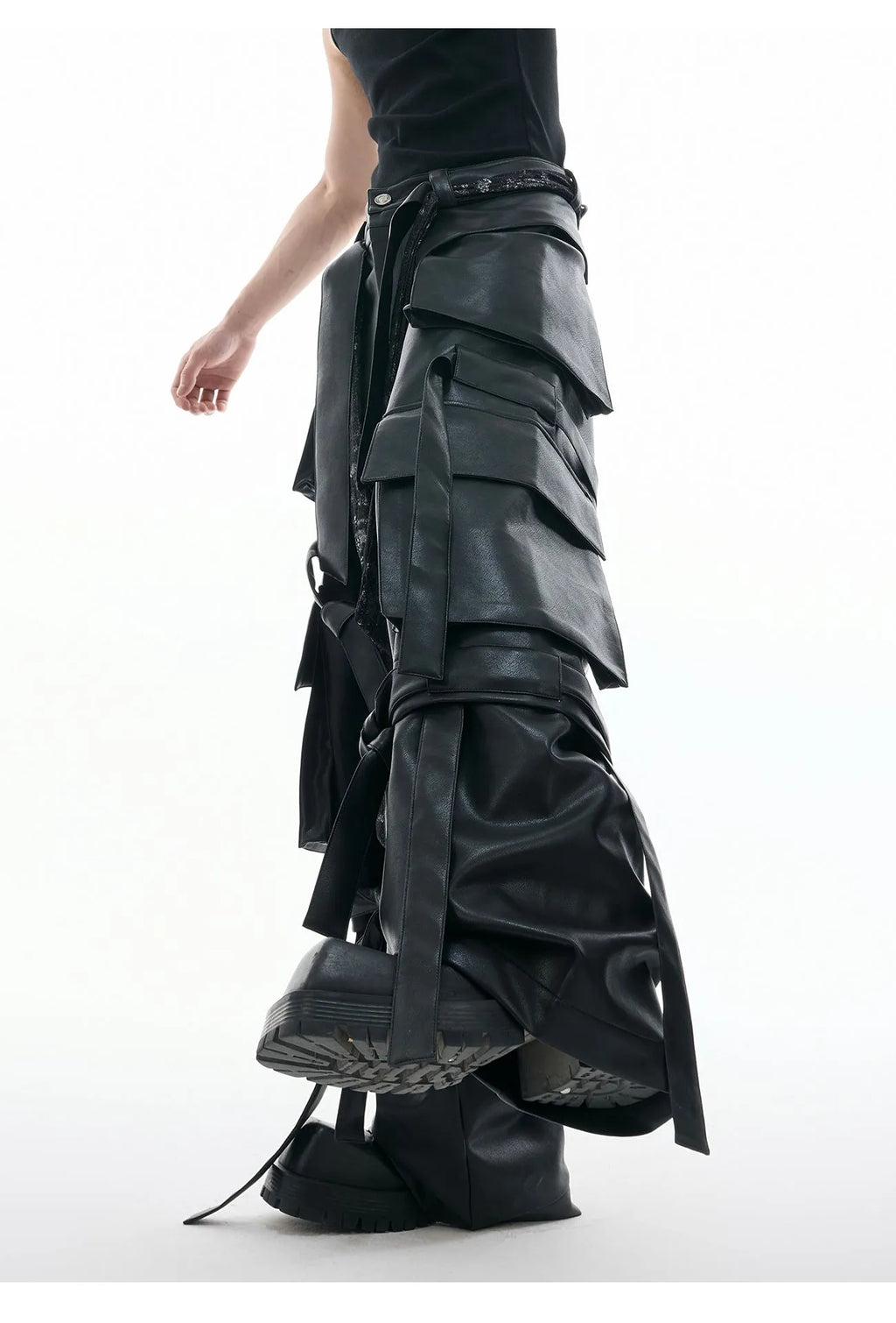 Black men's retro multi-pocket leather trousers with quilted stitching and loose fit.
