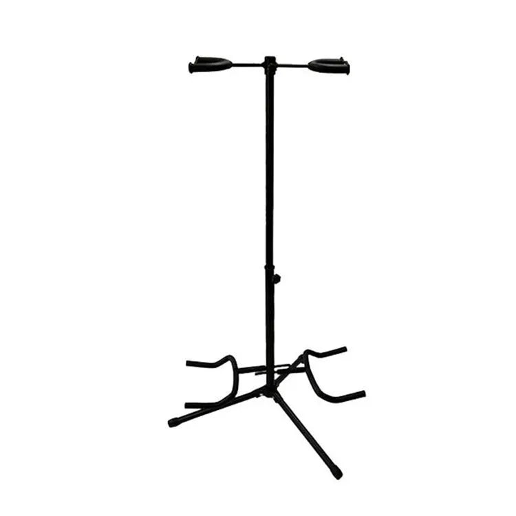 Black vertical double-headed iron guitar stand holding an acoustic guitar upright.