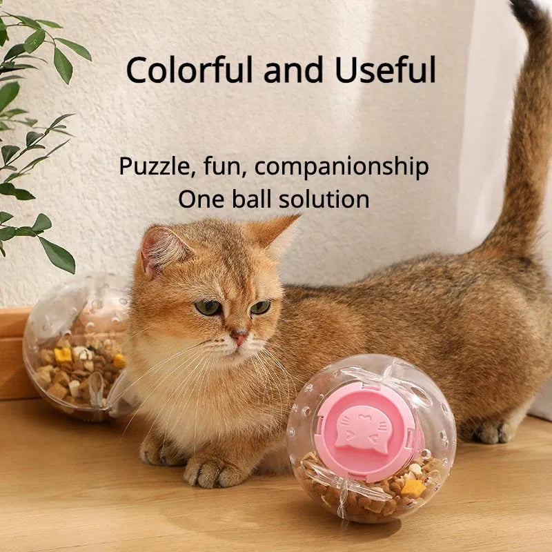 Blue slow feeding ball for cats and small dogs, 11.5cm ABS treat dispenser on floor