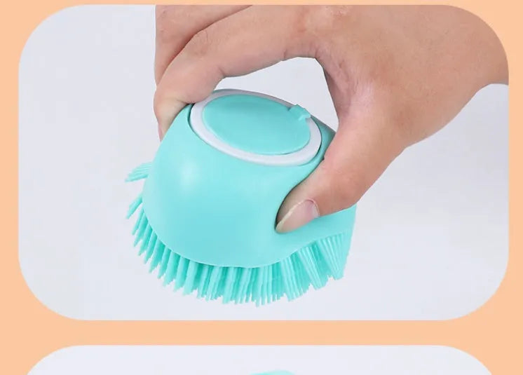 Blue silicone dog bath brush with flexible bristles on a white background