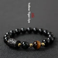 Unisex obsidian bracelet with 10mm round tiger eye beads in yellow, handcrafted retro style