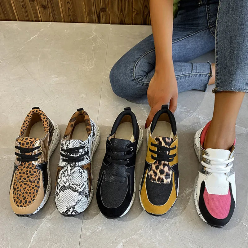 Women's suede casual sneakers with a wedge heel in leopard print colour.