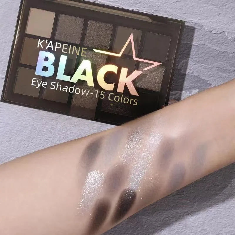 15-color eyeshadow palette open showing brown, blue, and earth tone shades