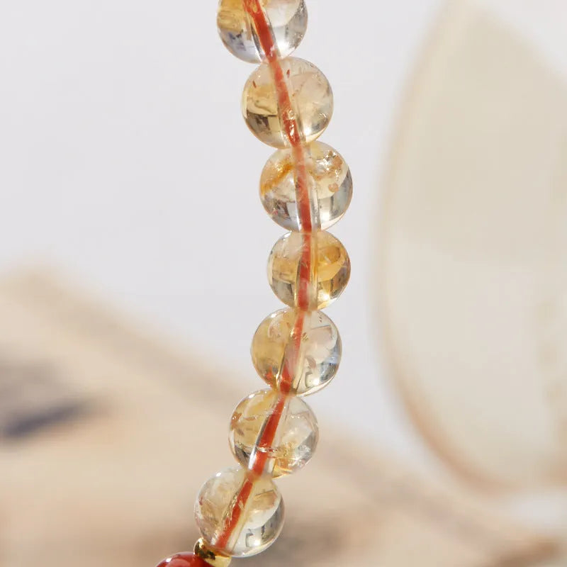Hand-woven citrine five sutra bracelet with 6mm crystals in geometric braided pattern
