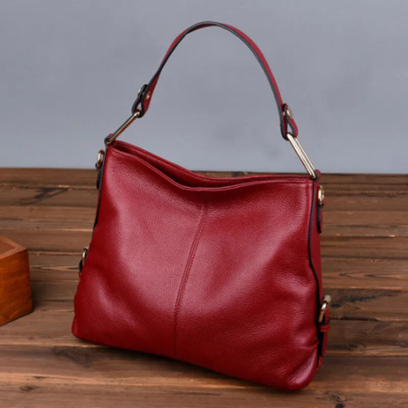 Genuine leather crossbody bag in vertical square shape with internal organisers and crossbody strap