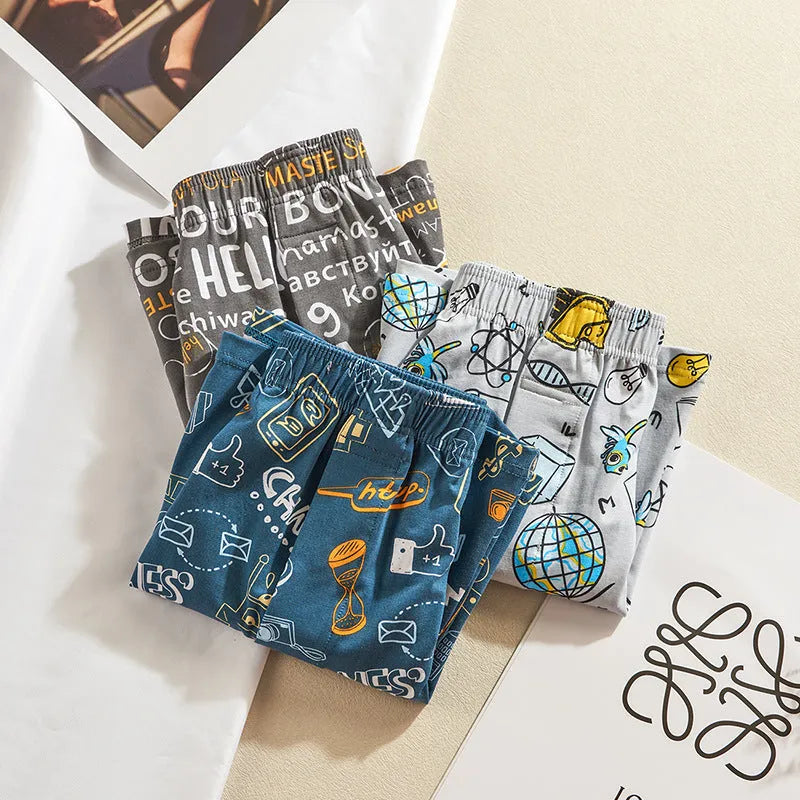 Men's cotton knitted boxers in Lake Blue with elasticated waistband and soft fabric, shown flat.