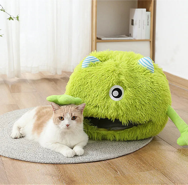 Round plush cat bed with non-slip base in three size options for indoor pets