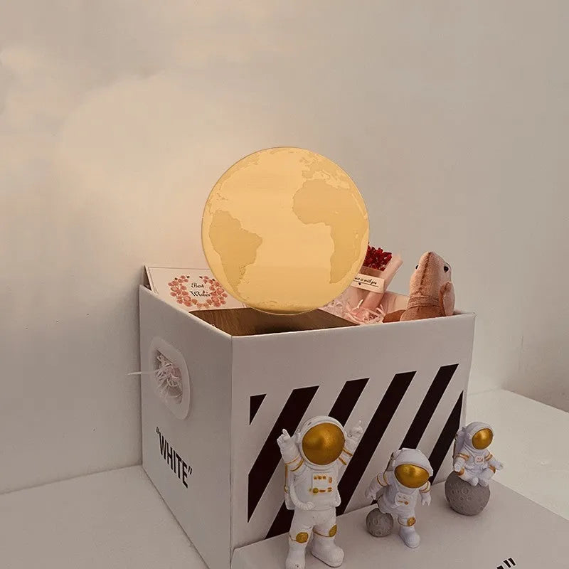 Maglev floating Moon night light with astronaut figures and USB power connection