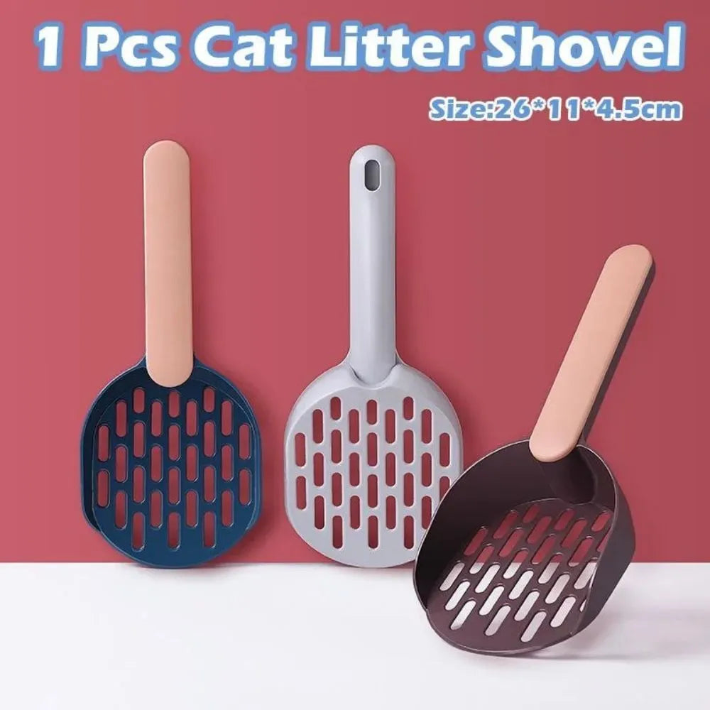 Plastic cat litter shovel in blue, green, and pink 26.6cm long for cleaning litter boxes