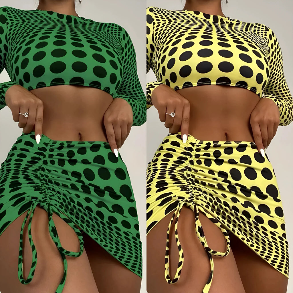 Women's green polka dot three-piece swimsuit set with top, skirt, and bra