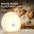 White rechargeable baby night feeding comforter with music function on a plain background.