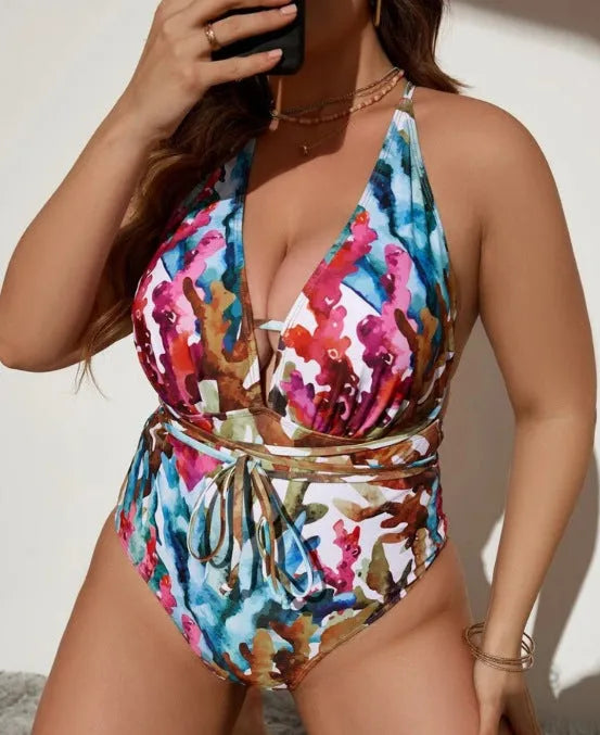 Women's solid blue halter neck one-piece bikini swimsuit on a mannequin
