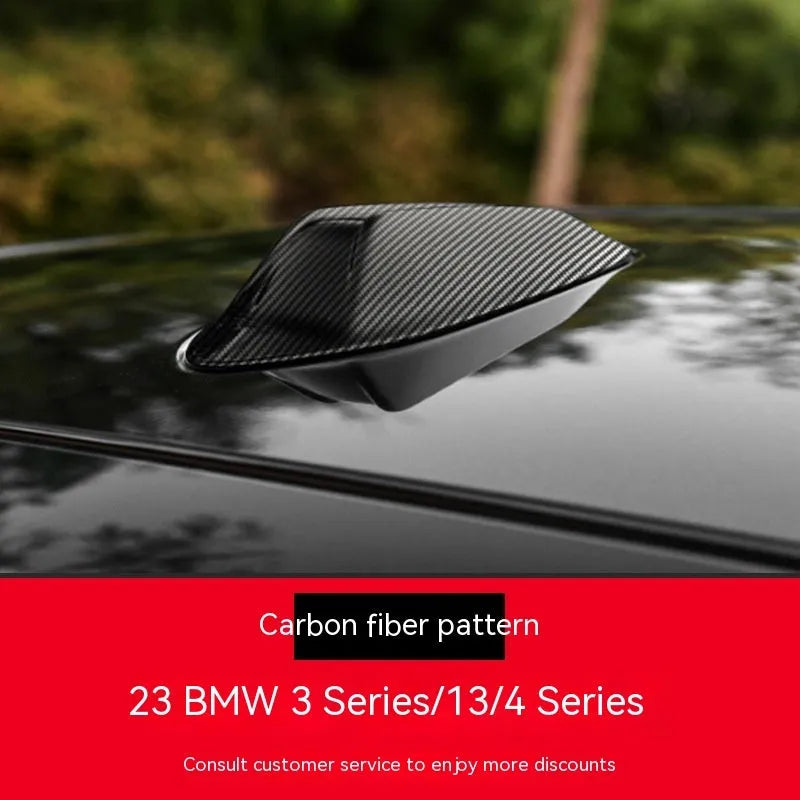 BMW shark fin antenna cover in carbon fibre drill pattern finish on a car roof