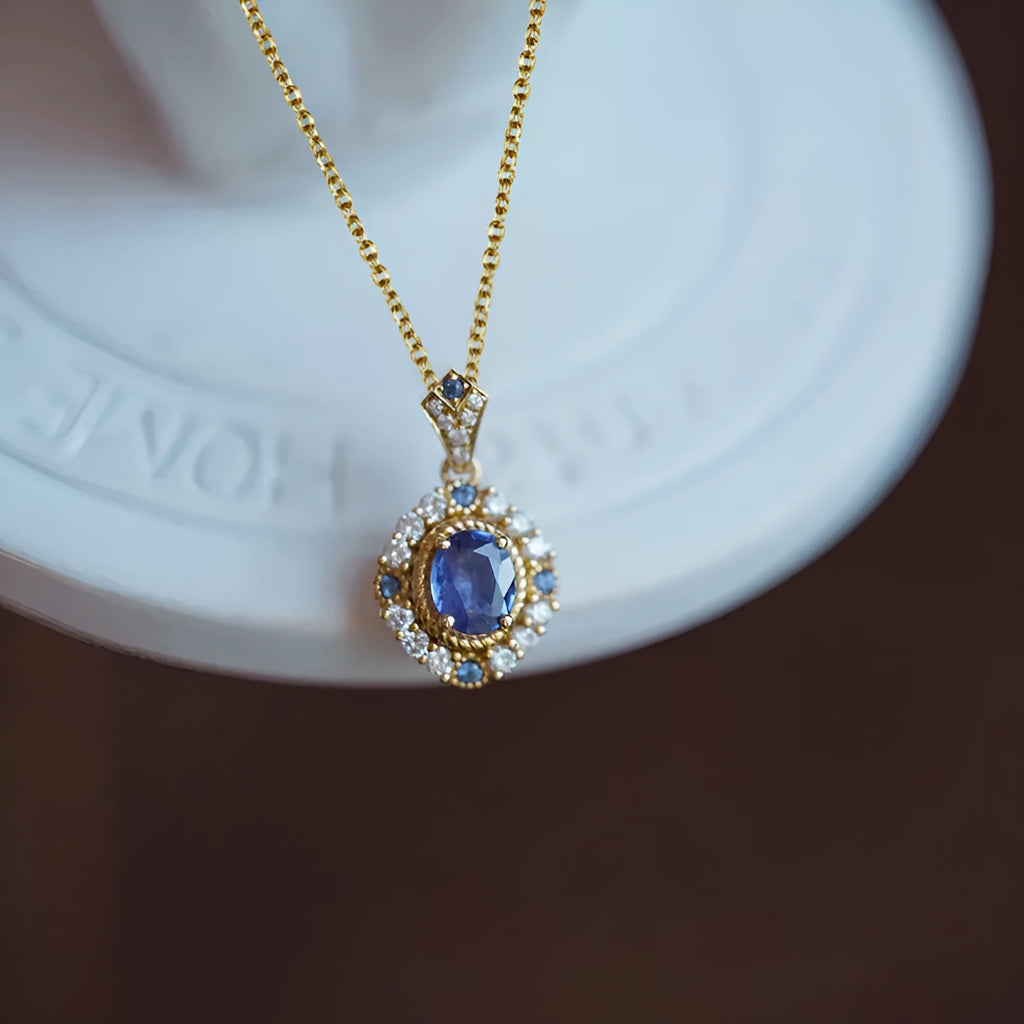 Women's royal necklace with mixed gem inlaid pendant on adjustable box chain in yellow gold colour