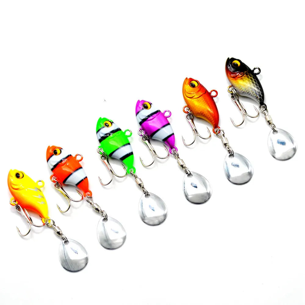 Metal sea fishing iron plate lure with rotating sequins in gold colour.