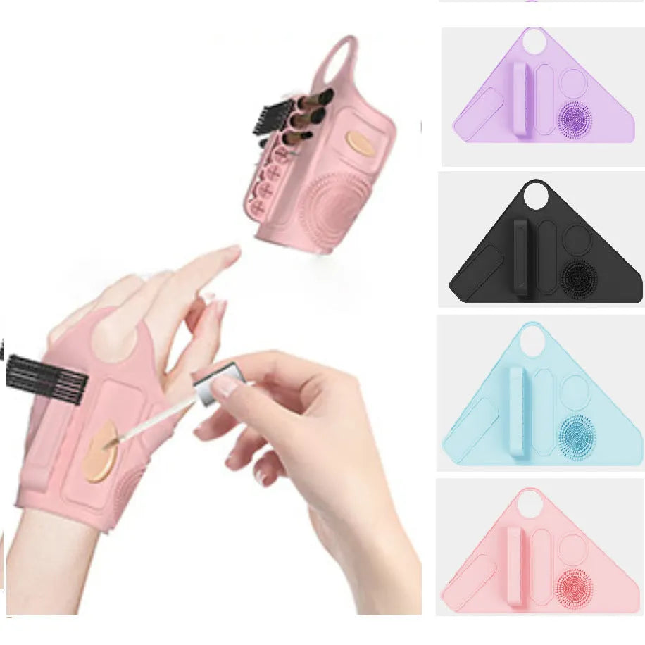 Silicone makeup wrist strap in purple holding a foundation brush against a wrist