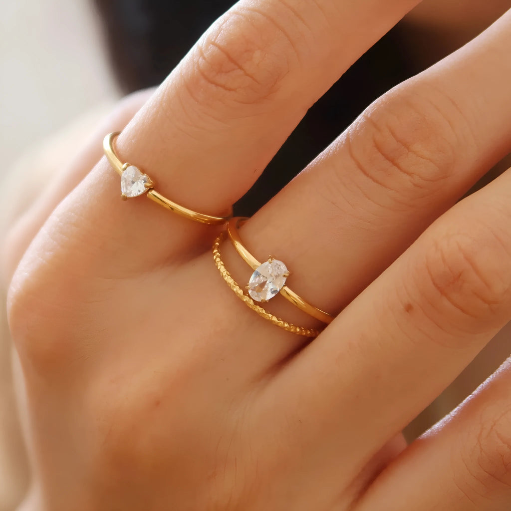Golden heart or oval stainless steel ring with heart shape design available in sizes No 5 to No 8