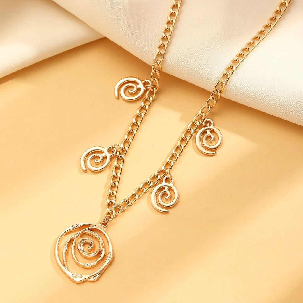 Spiral donut geometric jewellery set with necklace bracelet earrings in gold finish
