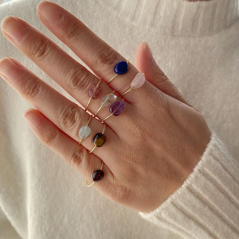 Geometric agate ring for women showing structured design with coloured natural stone centrepiece