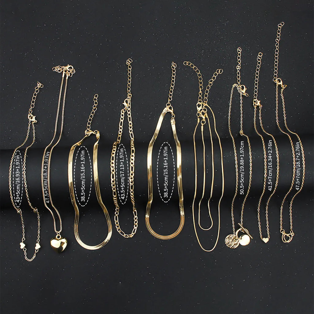 10-piece women's gold electroplated necklace set with adjustable length and snake bone chain design