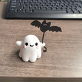 Mini ghost walking dog Halloween statue with ghost holding bat design on resin base