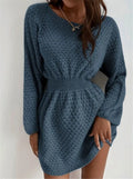 Blue women's knitted dress with hand-crocheted floral details and fitted waist design