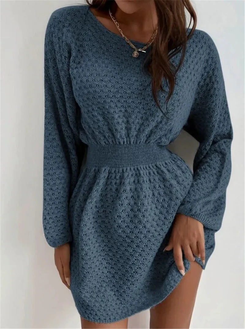 Blue women's knitted dress with hand-crocheted floral details and fitted waist design