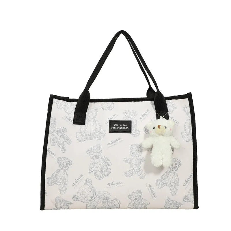 Women's large capacity canvas tote bag with rhombus pattern and sandwich pocket in black or white