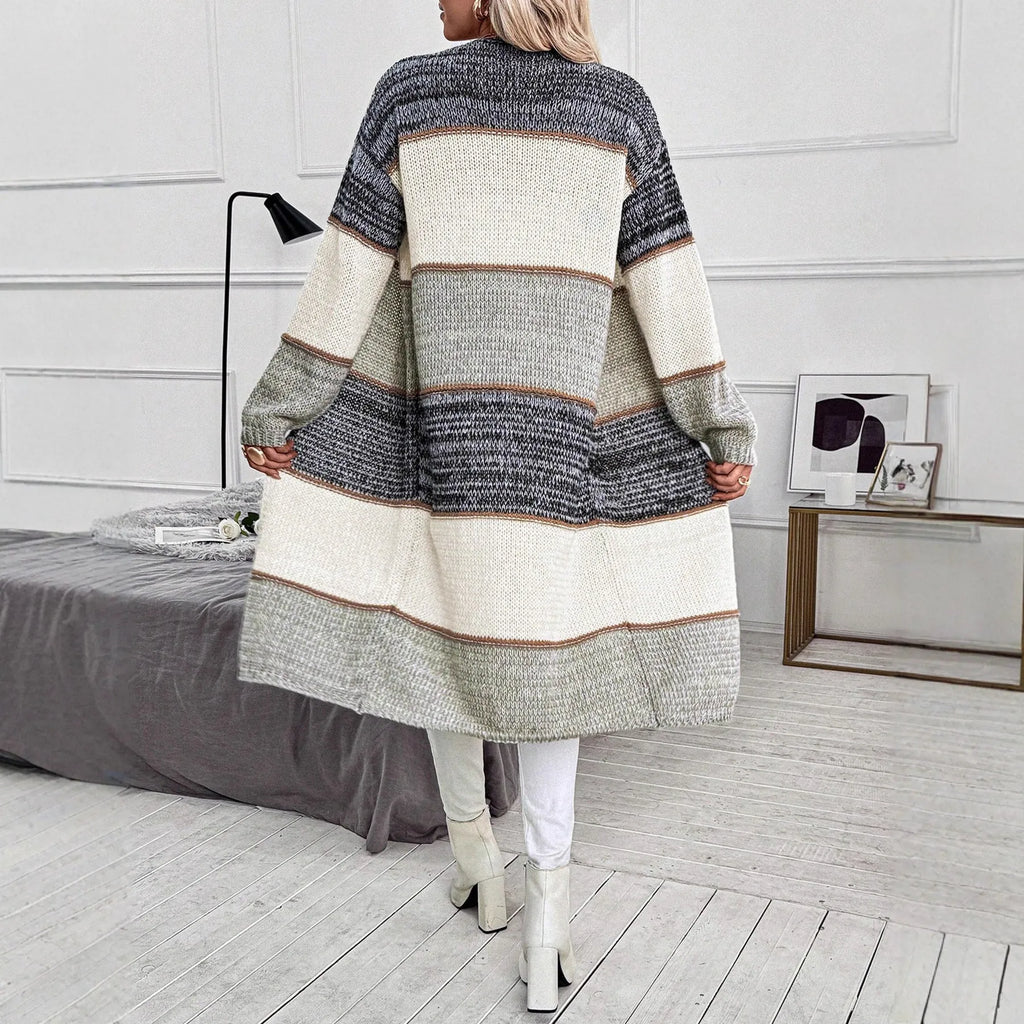 Women's grey striped knitted cardigan with long sleeves and loose fit design