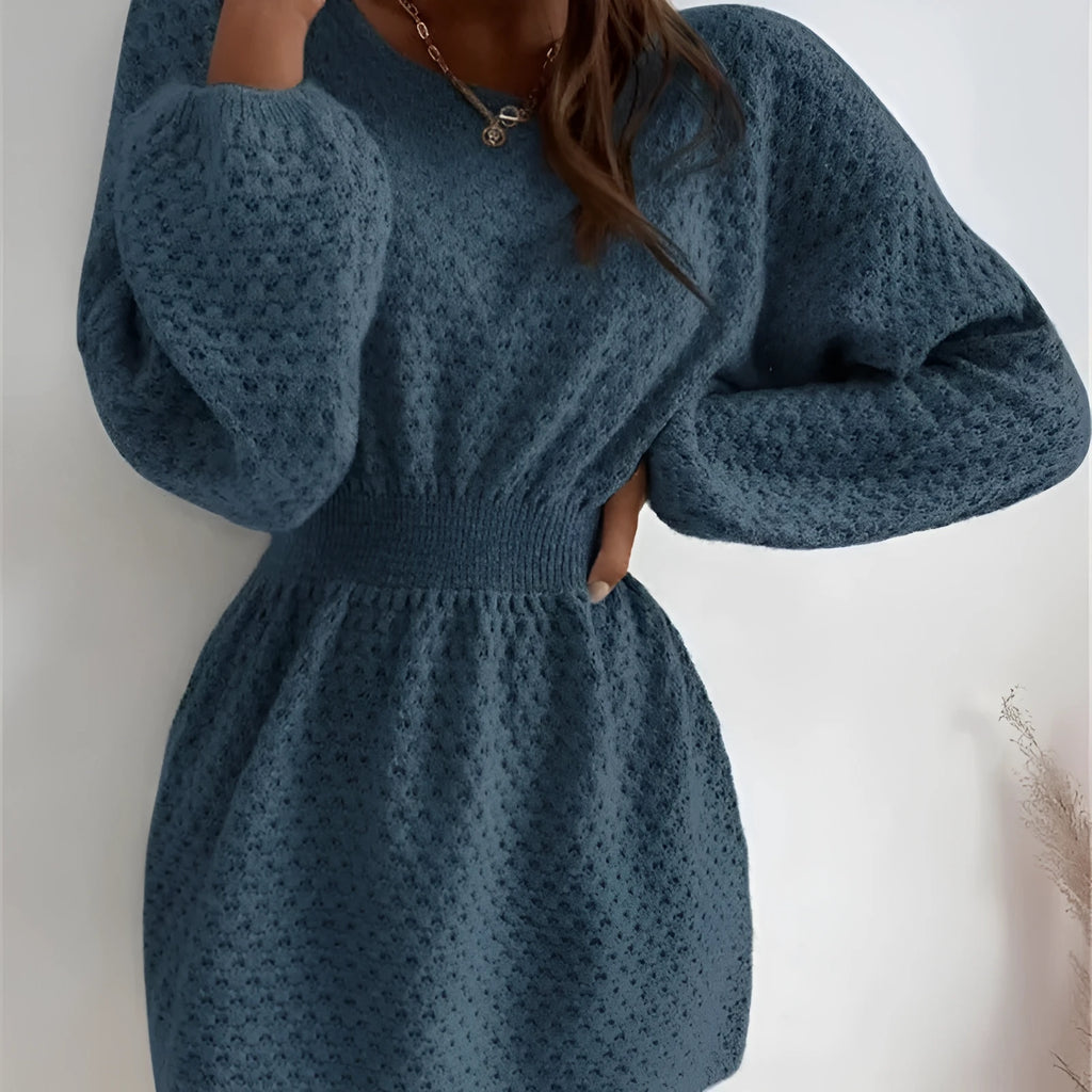 Blue women's knitted dress with hand-crocheted floral details and fitted waist design