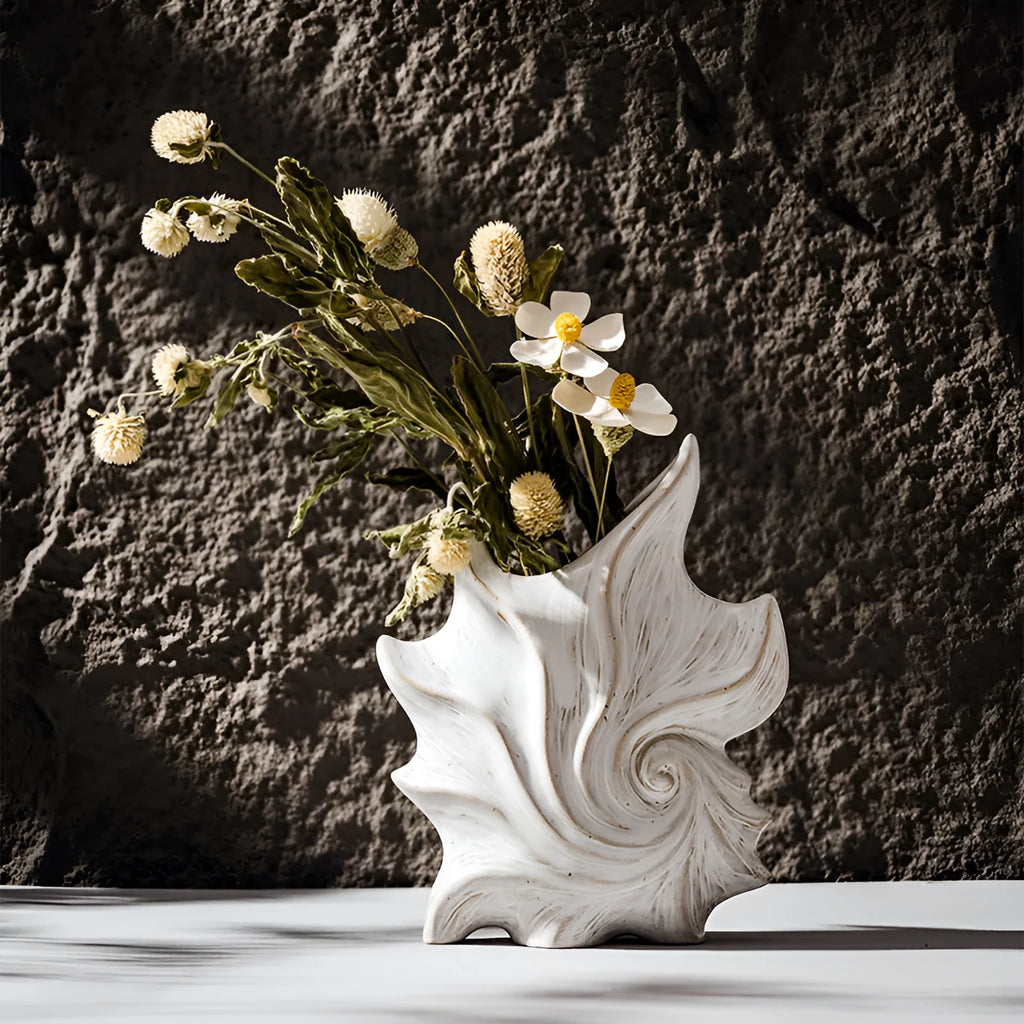 European retro style ceramic vase with a coloured glaze finish on a wooden surface.